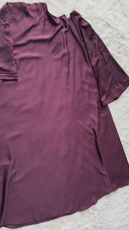 Full length plum luxury abaya crafted from premium Nida fabric with soft drape and elegant flare design video