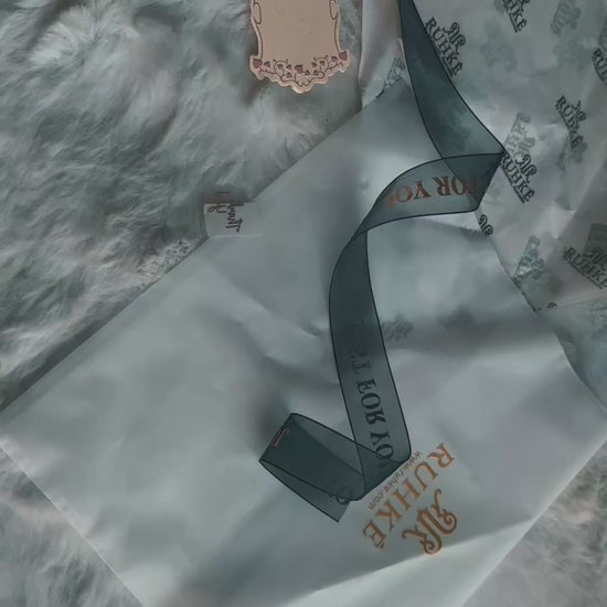 Detail Video High-end luxury packaging showcasing RUHKÉ signature branding