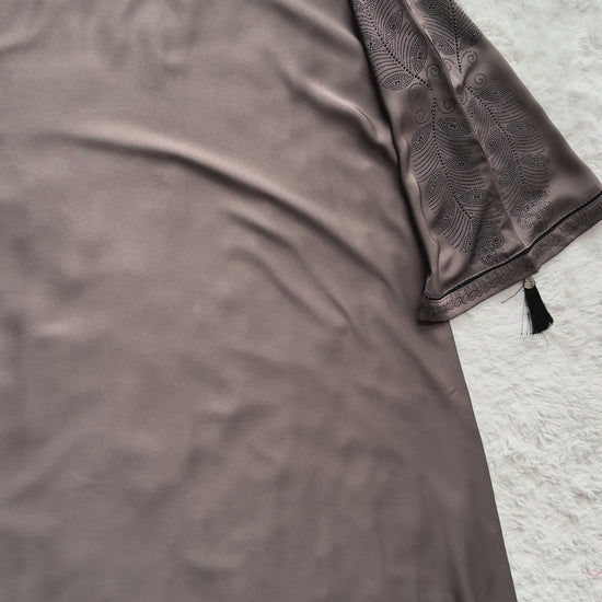 Luxury grey premium Nida abaya featuring full flare silhouette with elegant cut-work embroidery on sleeves, modest designer abaya by RUHKÉ videos