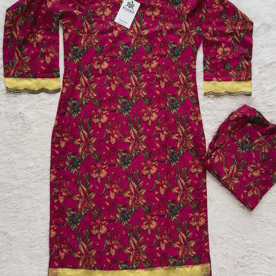 Flat lay of printed lawn 2 piece suit including shirt and trouser